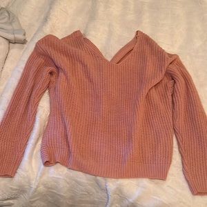 Never worn but knitting has a small spot due to hanging